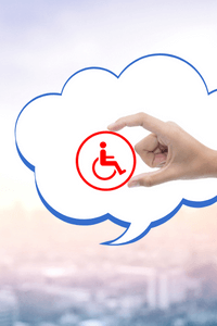 A hand in a thought bubble holding an image of a person in a wheelchair